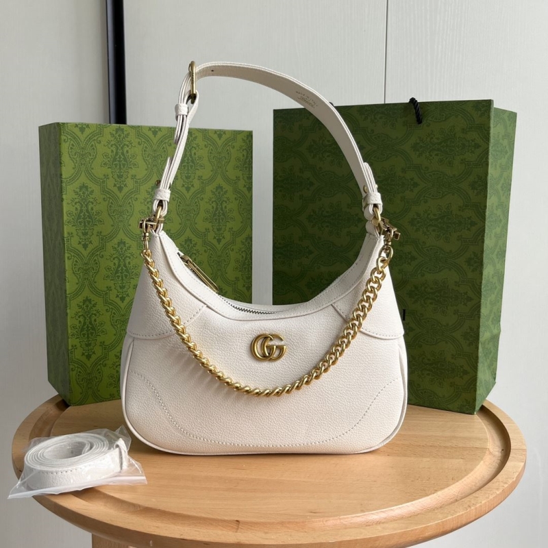 G*u*i top handle bags
